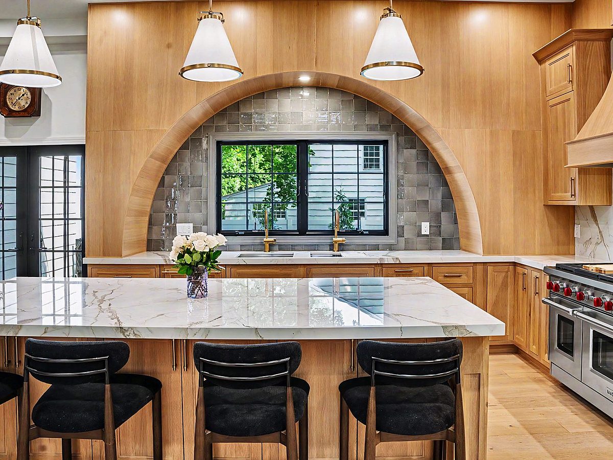 Shiloh flush-inset rift white oak kitchen with an arched range niche — installed by My House Kitchen