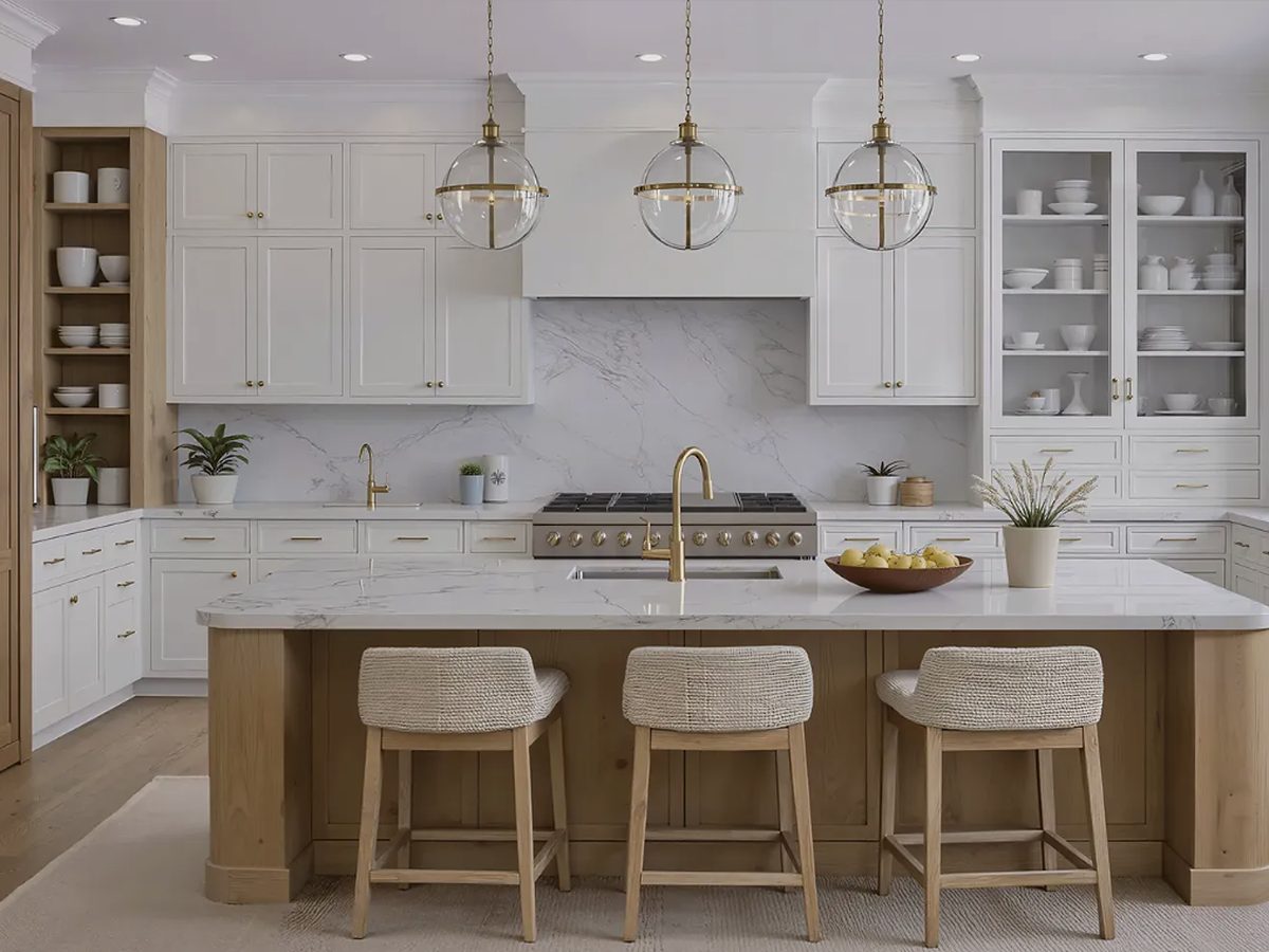 St. Martin Cabinetry Dover door in Simply White with a Weathered Walnut island — manufacturer photo