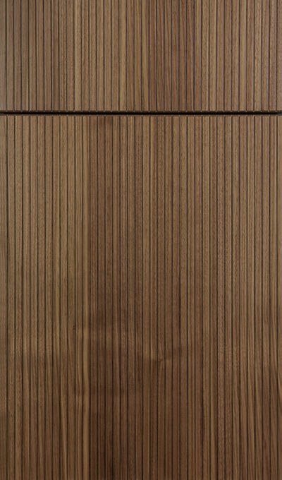 Plain & Fancy Raya cabinet door in Natural on walnut — photographed by Plain & Fancy
