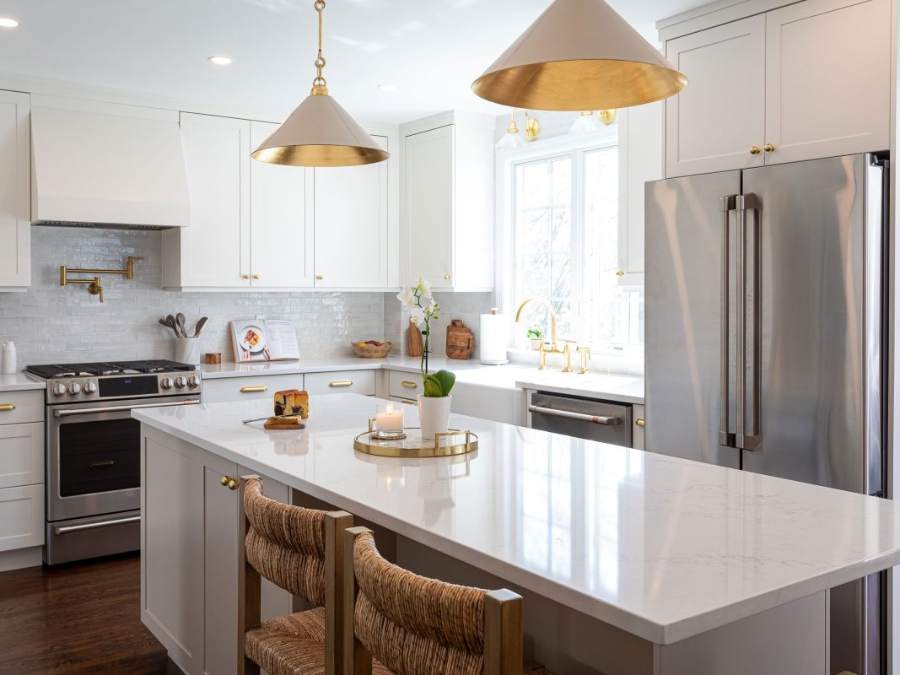 Crystal Modesto door in Alabaster with a Perfect Beige island — Crystal Cabinets photo