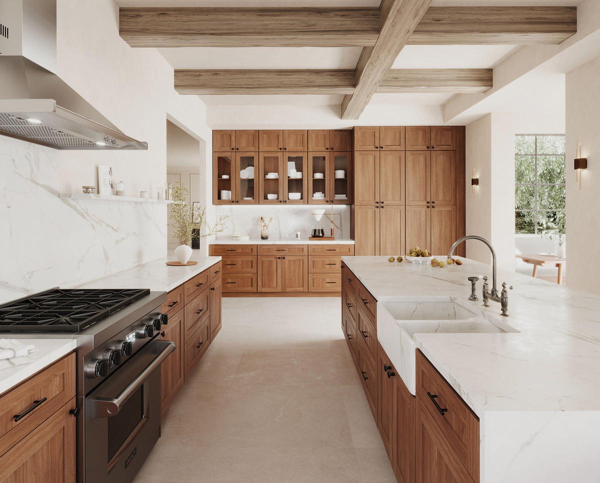 Forevermark kitchen in a warm wood tone with a marble-look island — manufacturer photo