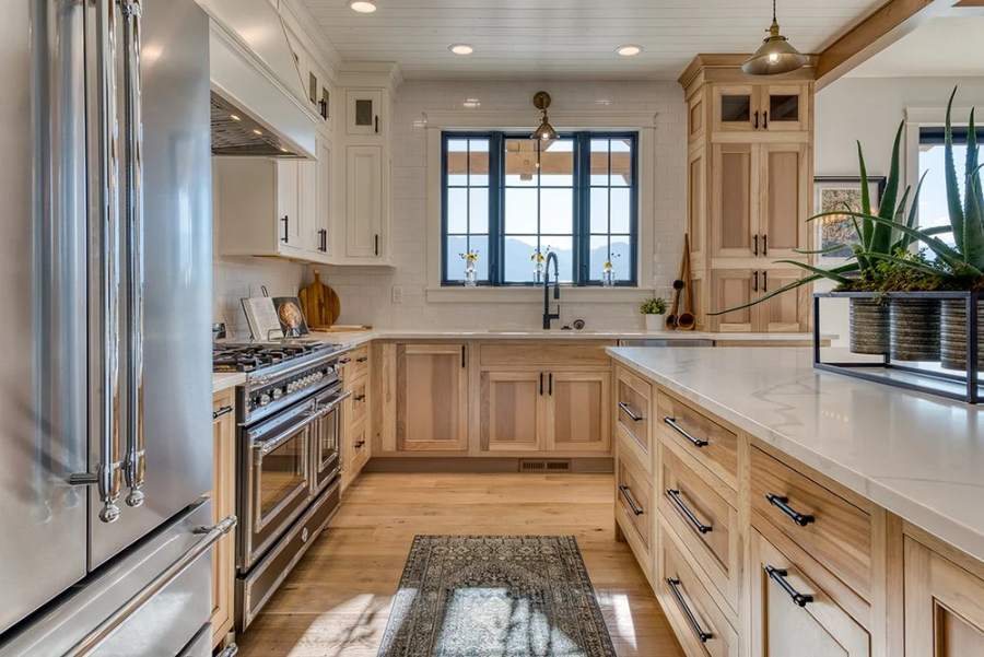 Great Northern Frosty White maple with custom-stained hickory, Nantucket door — manufacturer photo