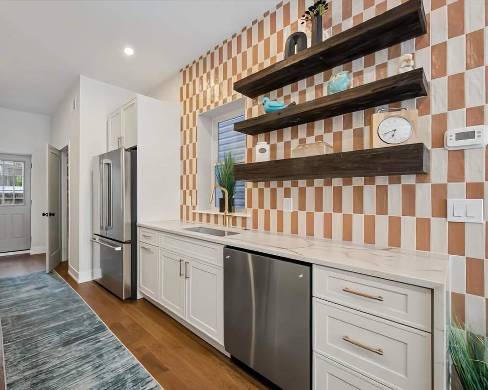WoodConcept Cascade Blanc white kitchen with floating shelves — manufacturer photo