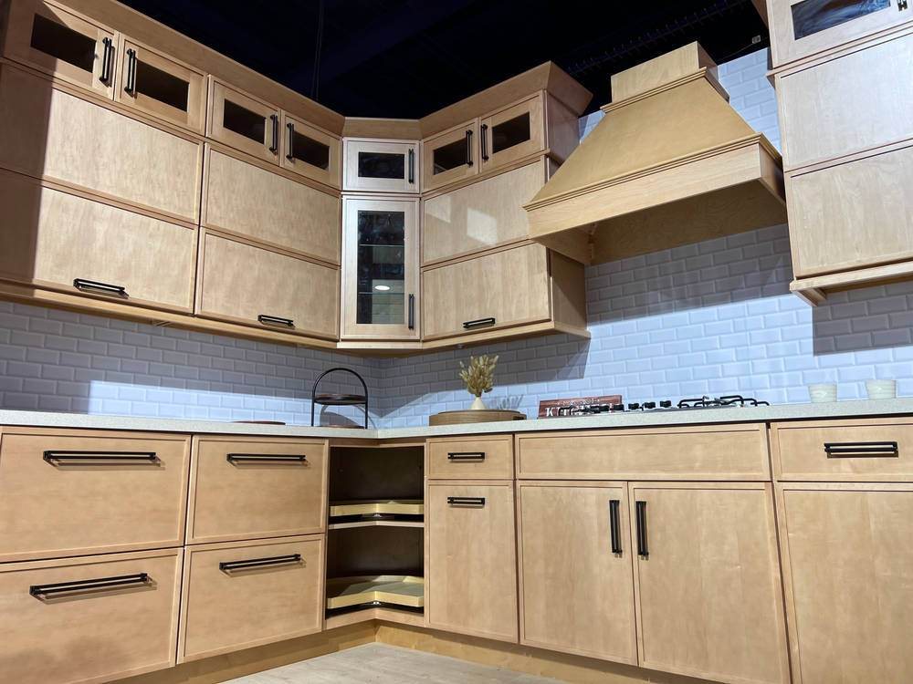 WoodConcept Profile Maple natural wood kitchen with a corner window — manufacturer photo