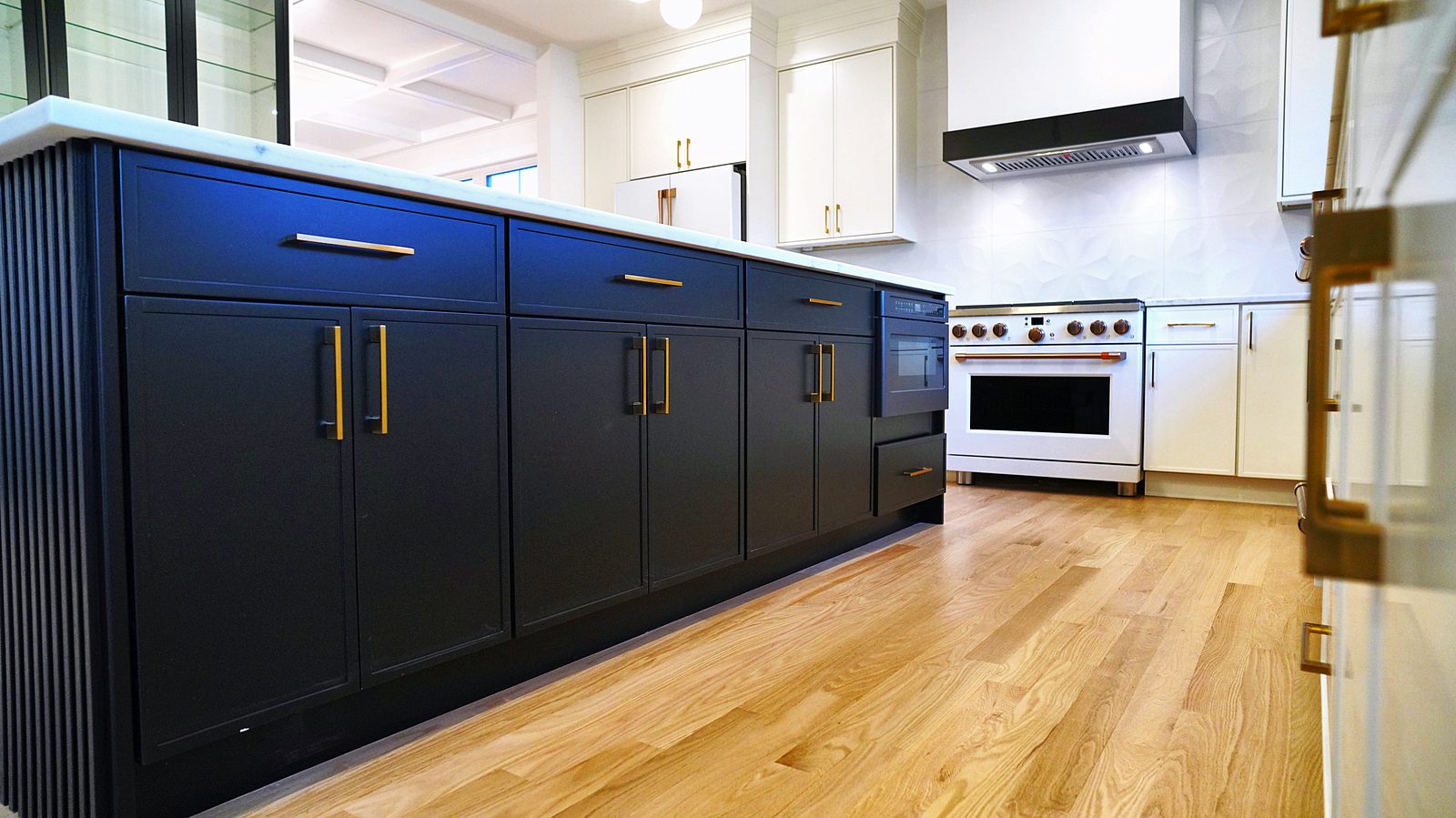 Fluted island detail with brass pulls