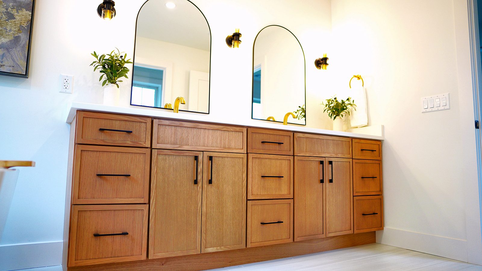 Timber vanity with brass faucets