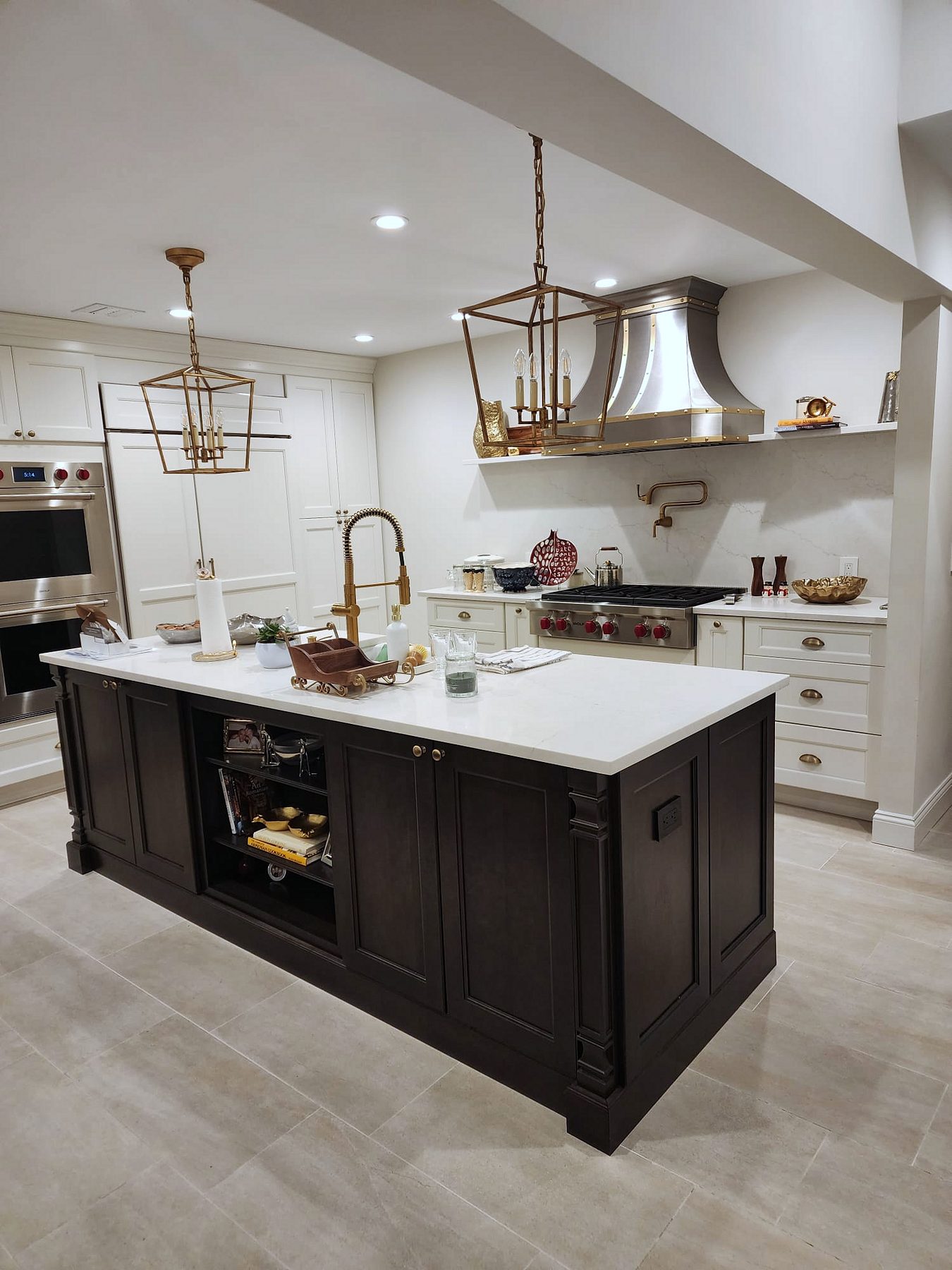 Fabuwood Fusion kitchen in Dove with a Kona island and brass lanterns
