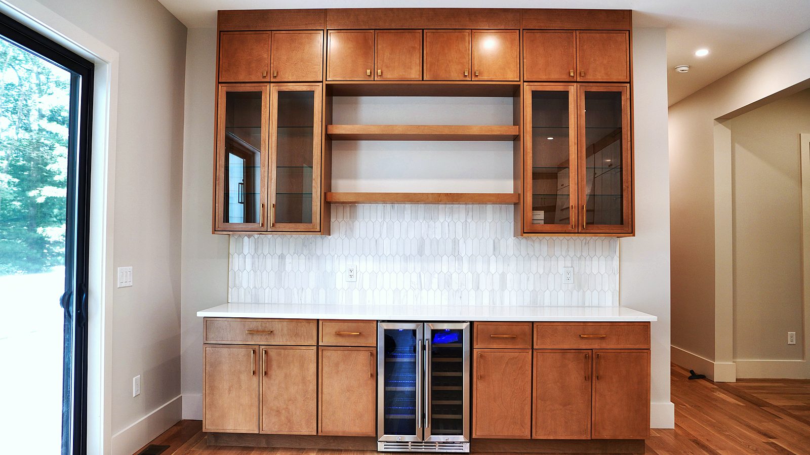 Timber bar with glass uppers and wine refrigerator