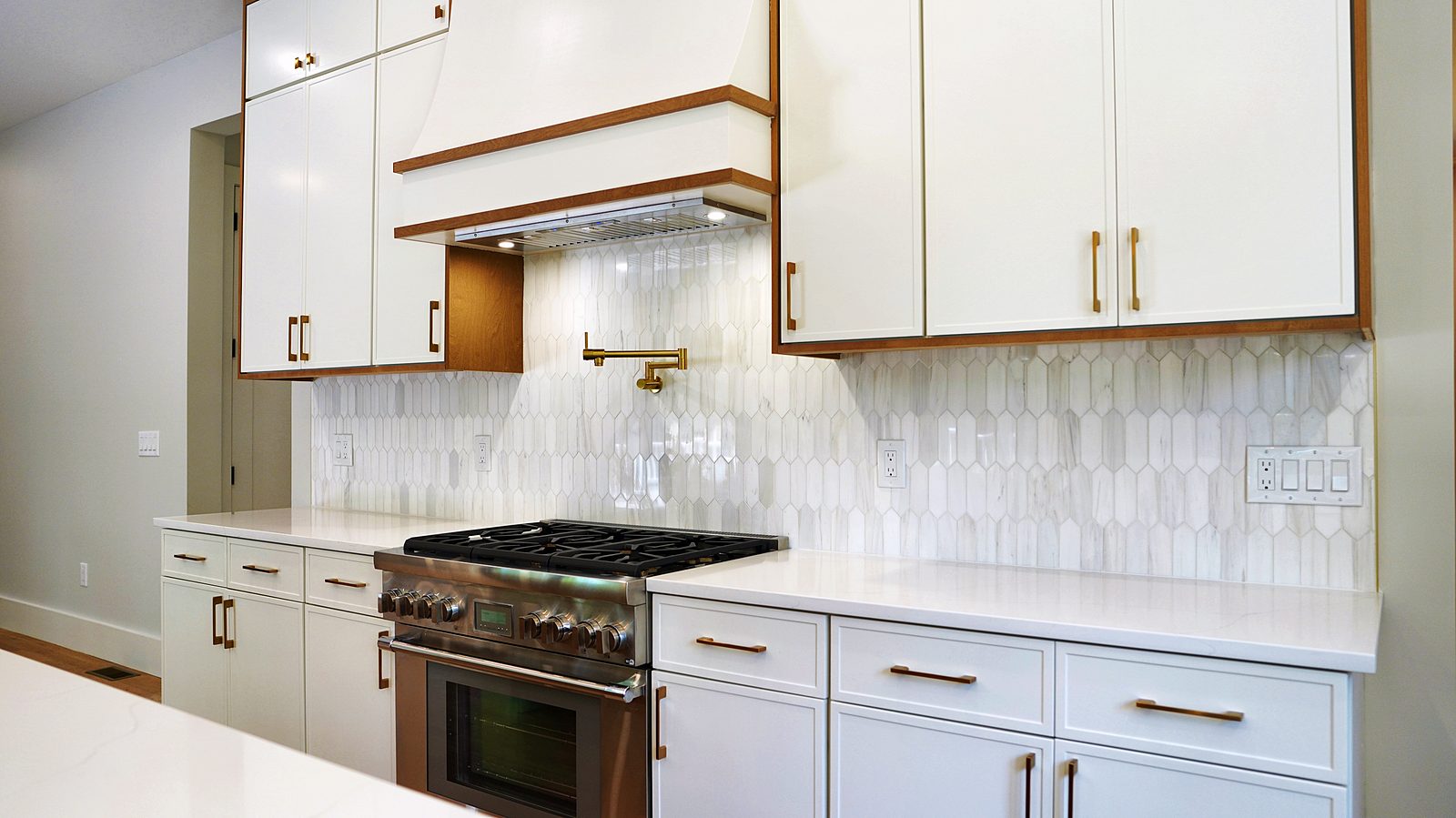 Range, pot filler and picket-tile backsplash