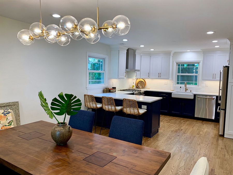 Kith Homestead kitchen in Bright White and Naval with Cashmere Carrara quartz