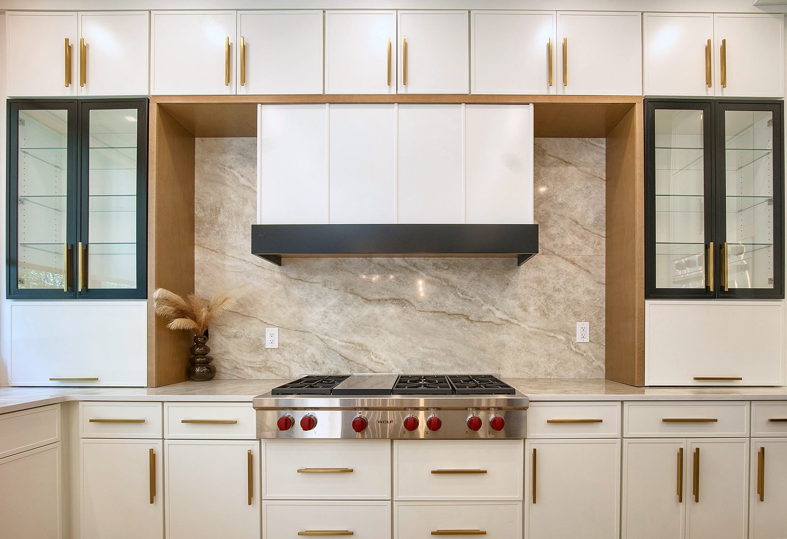 Range wall with Timber-framed hood and glass uppers