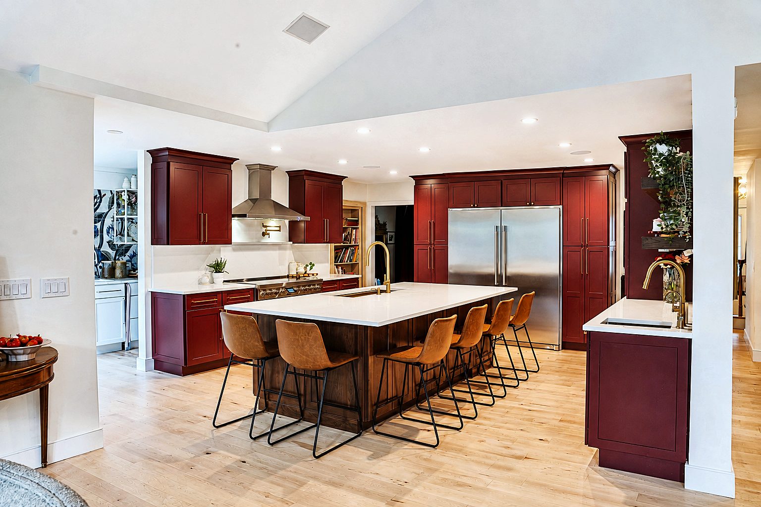 Cabernet Red cabinets with floating walnut shelves