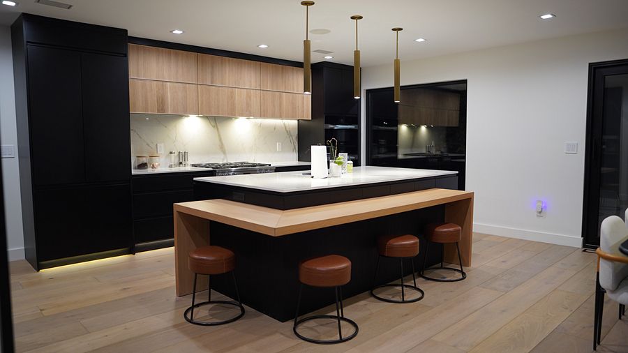 Project 39: Matte black and oak handleless kitchen with a waterfall island