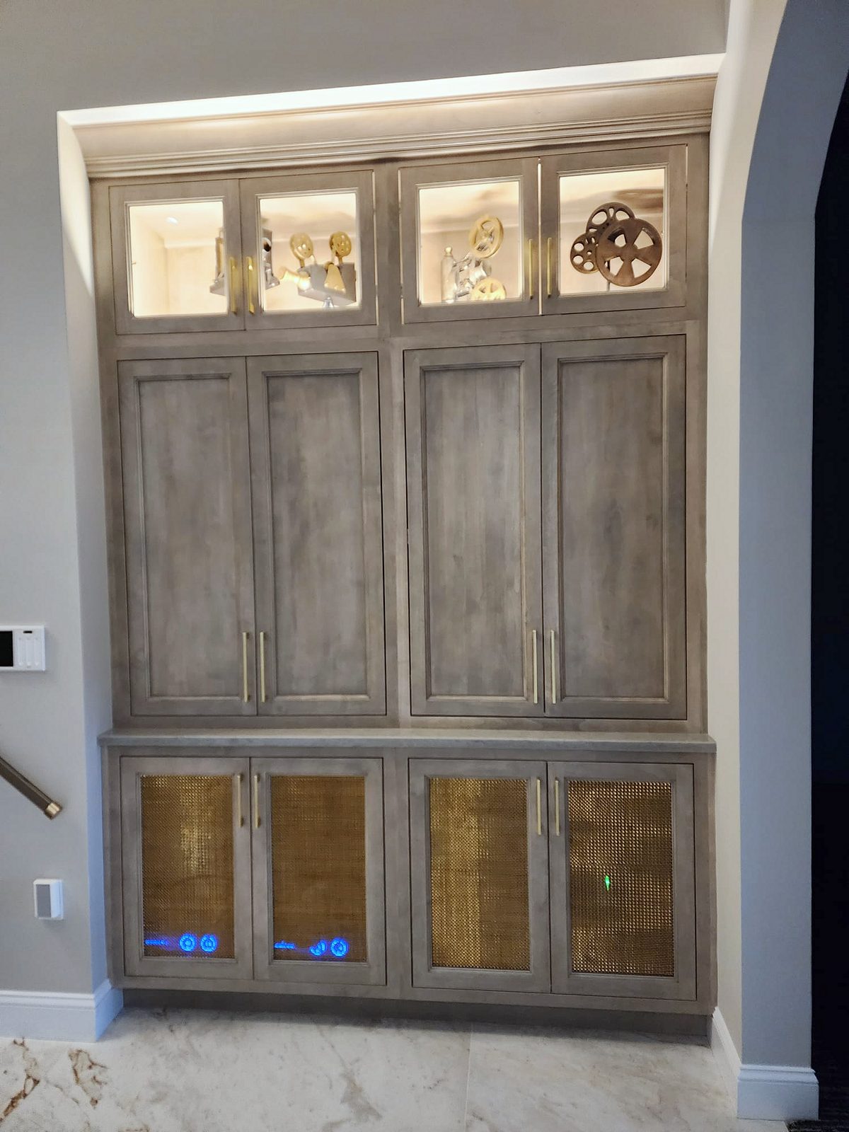 Shiloh Aspen inset kitchen in a brown stain with a lit bar wall and a butler’s pantry — photo 8