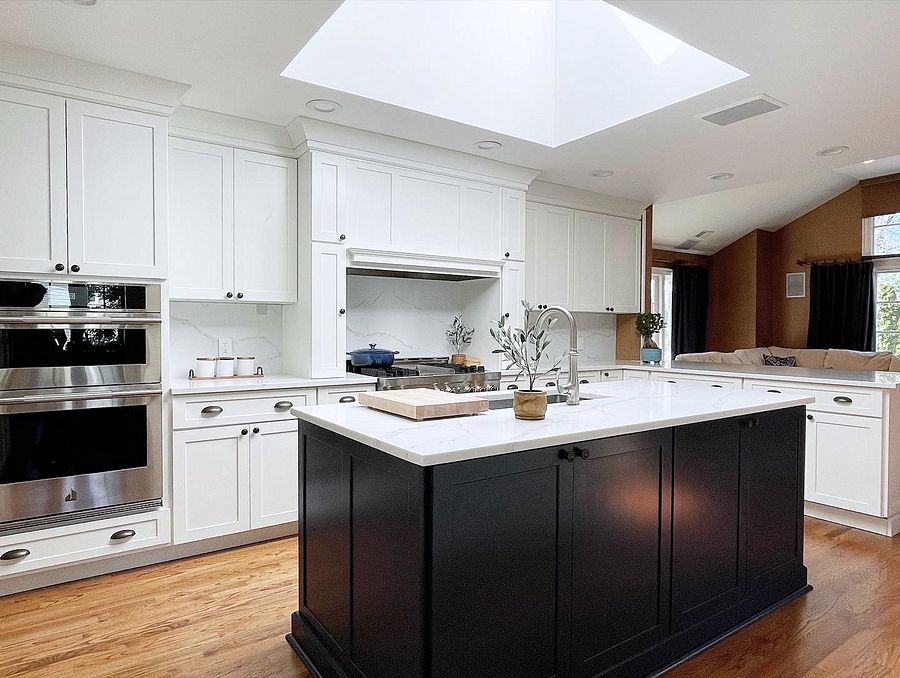 Project 146: Shiloh Hanover kitchen in Aspen with a black island and a skylight