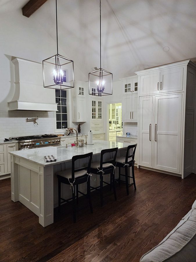 Project 144: Shiloh Heritage beaded-inset kitchen under a vaulted ceiling with a curved hood