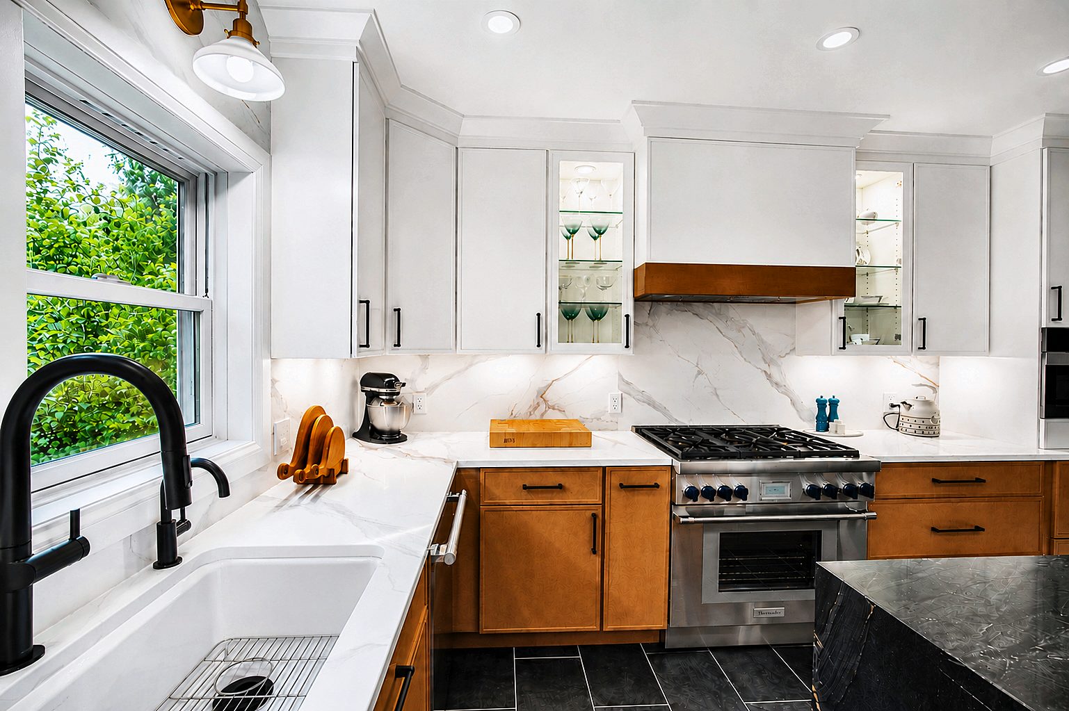 Black faucet and farmhouse sink detail