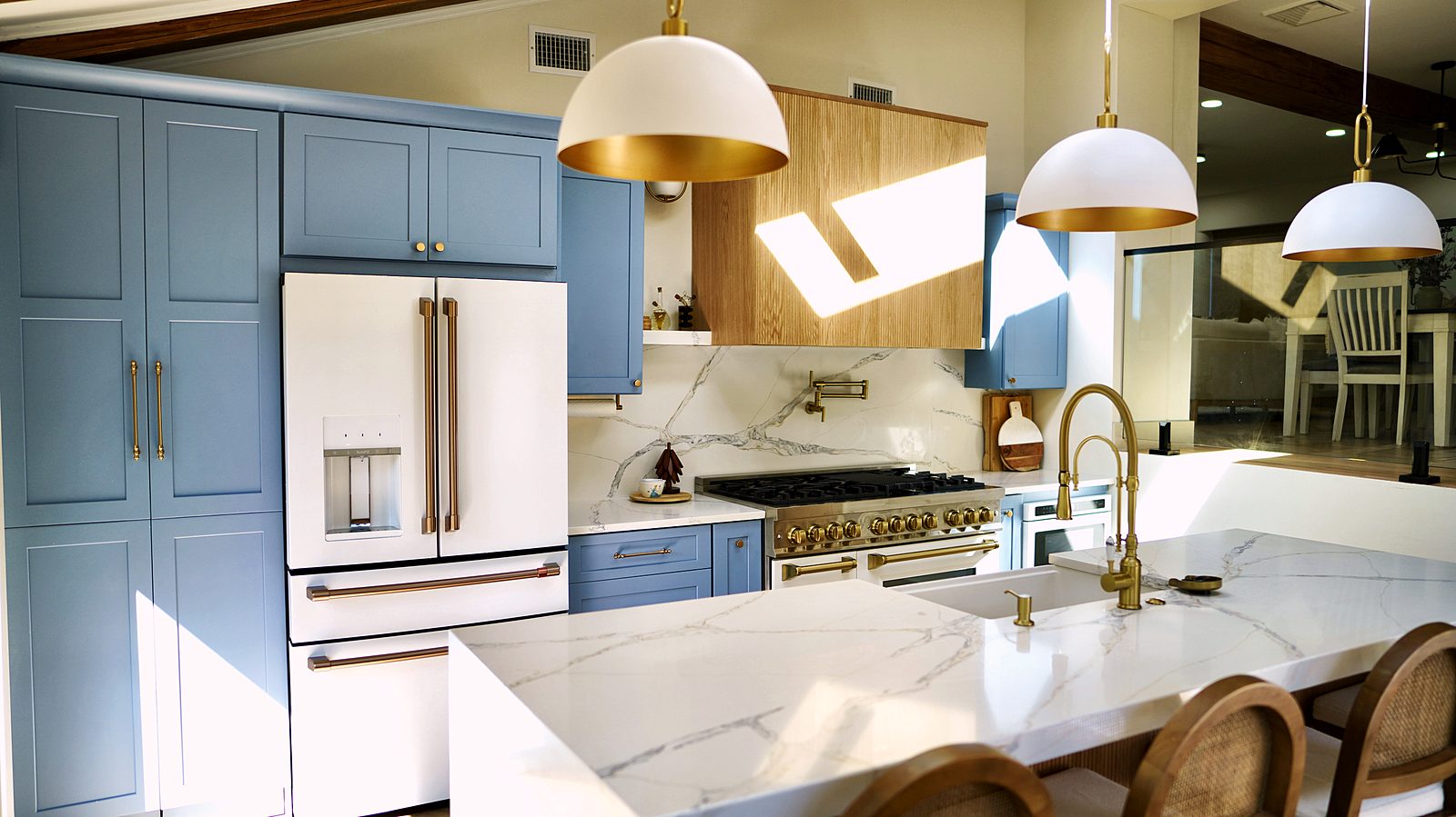 Café matte-white refrigerator in Ocean Blue cabinets