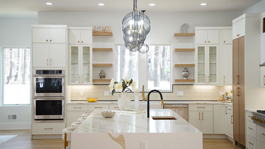 Fabuwood Luna kitchen in Dove and Timber with a Calacatta-look waterfall island