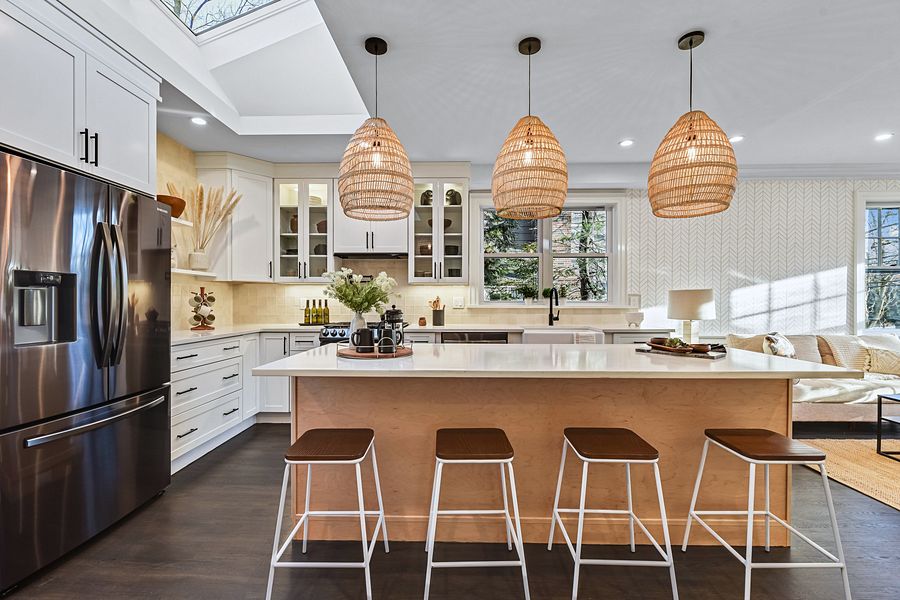 Project 53: White shaker kitchen with a natural wood island and rattan pendants