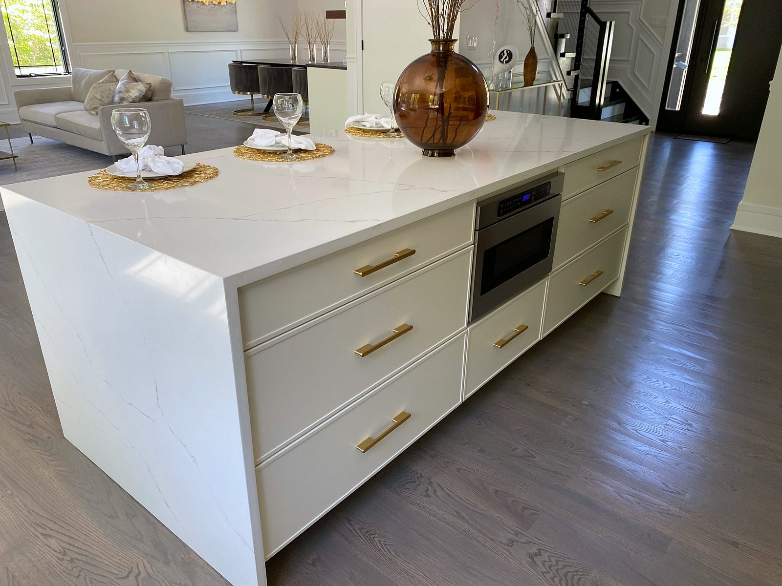 White slab and walnut kitchen with a waterfall island — photo 6
