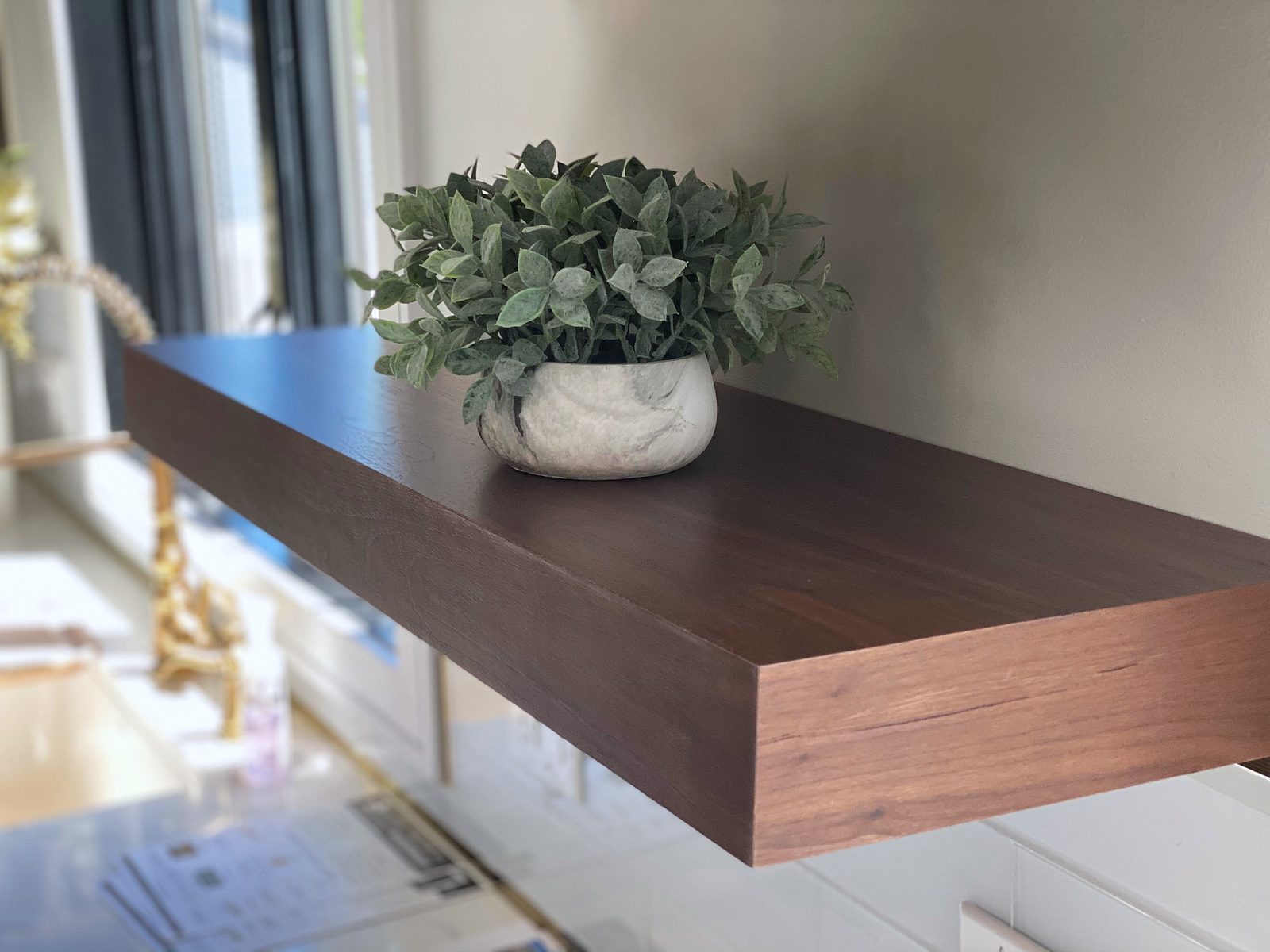 White slab and walnut kitchen with a waterfall island — photo 7