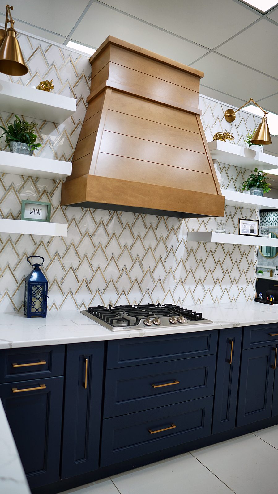 Kitchen display at My House Kitchen — Oak hood and navy display